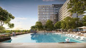 Tranquil adult swimming pool at Emaar Club Drive at Dubai Hills Estate, featuring modern design and lush surroundings.